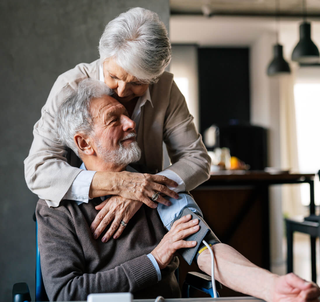 Senior couple measuring blood pressure