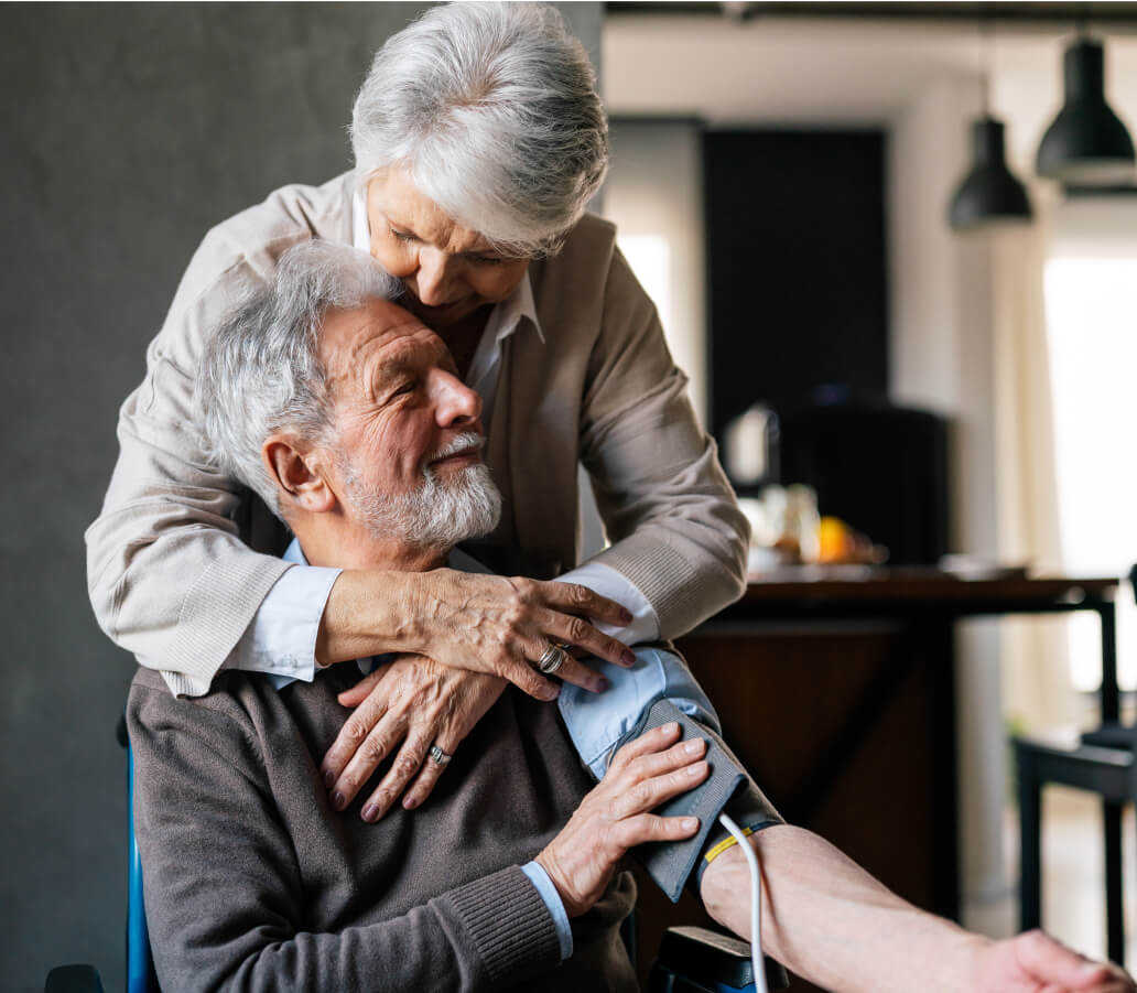 Senior couple measuring blood pressure
