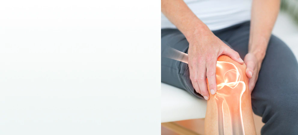 A person holding their knee with a glowing joint illustration, symbolizing the need for supplements for bone and joint health.
