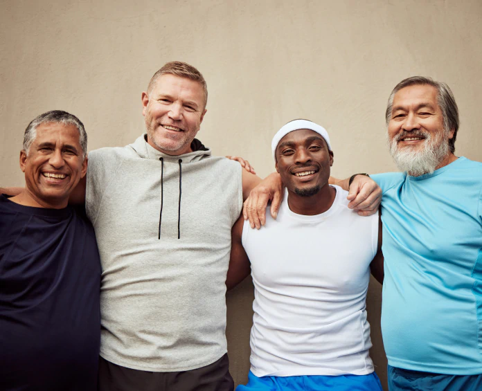 Four healthy and happy men after using supplements for men's health