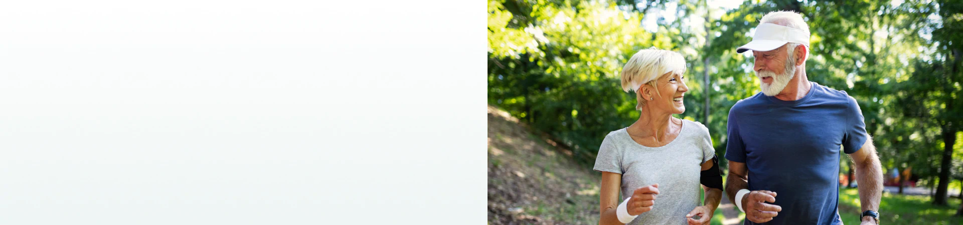 A senior couple jogging outdoors, smiling and enjoying an active lifestyle supported by supplements for optimal health.