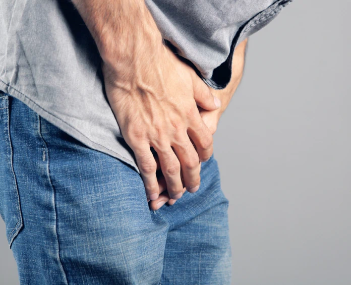 A medical illustration of a normal and enlarged prostate, highlighting urinary issues and the role of prostate health supplements.